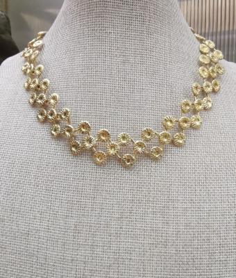 collier-in-bronzo-giallo-con-e