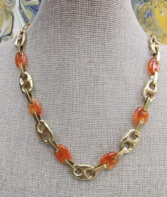 collana-in-bronzo-giallo-con-c